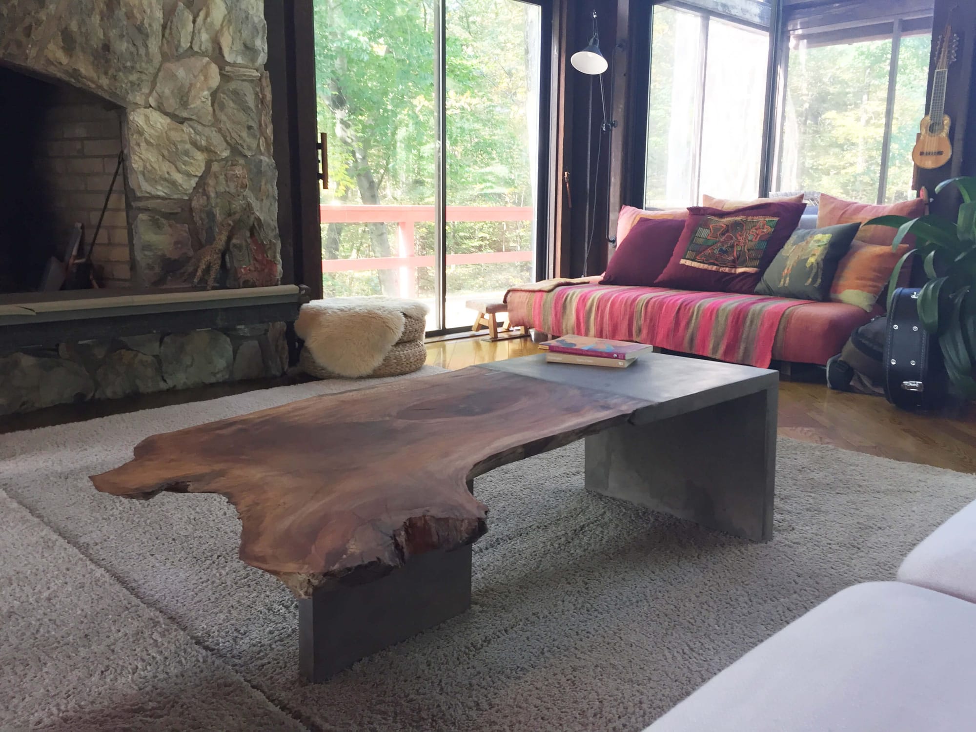 A driftwood-and-concrete living room table by Brad Teasdale