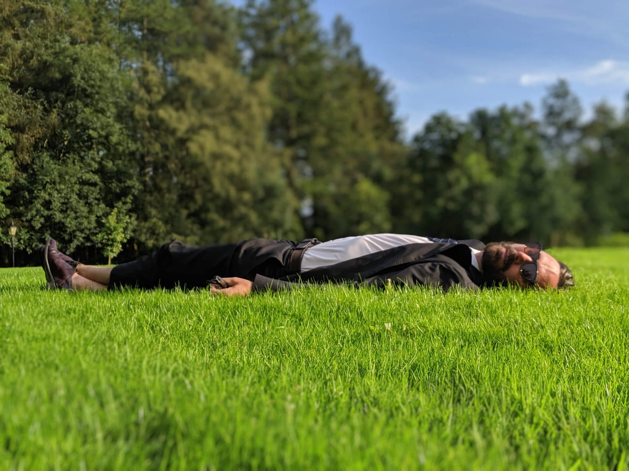 Matt Pond laying in grass