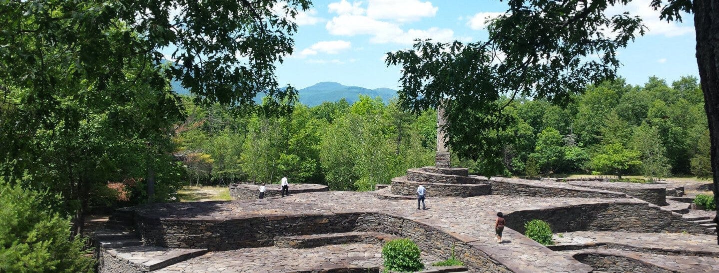 A wide angle of Opus 40 with the Catskills in the distance